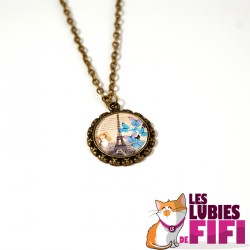 Collier : la Tour Eiffel et les papillons bleus