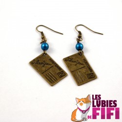 Boucles d'oreille papillon bronze et fushia