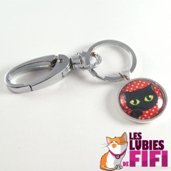 Porte-clé chat : chat noir sur fond rouge à pois