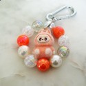 Porte-clés Labubu orange – bijou de sac perles irisées